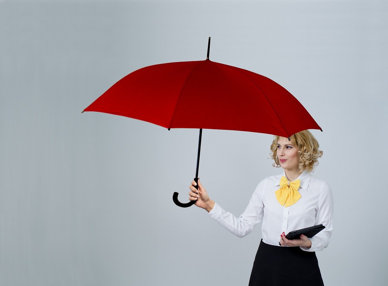 Image of a woman with travel insurance documents